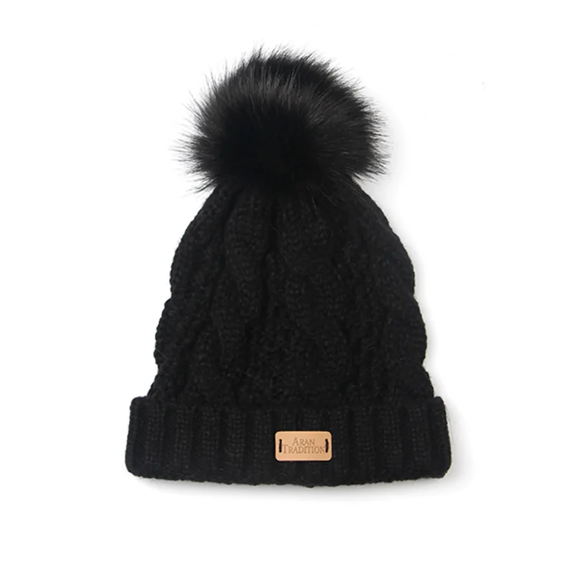 aran hat with faux fur pompom