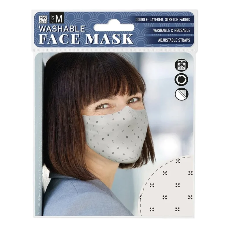 cream face masks with black cross design