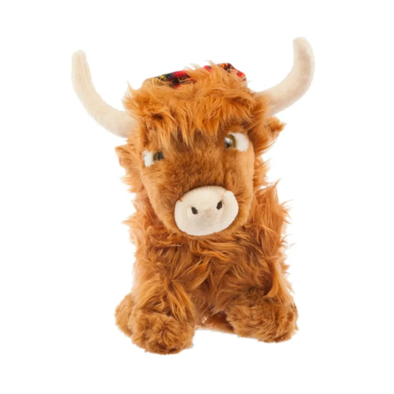 highland cow in tartan hat