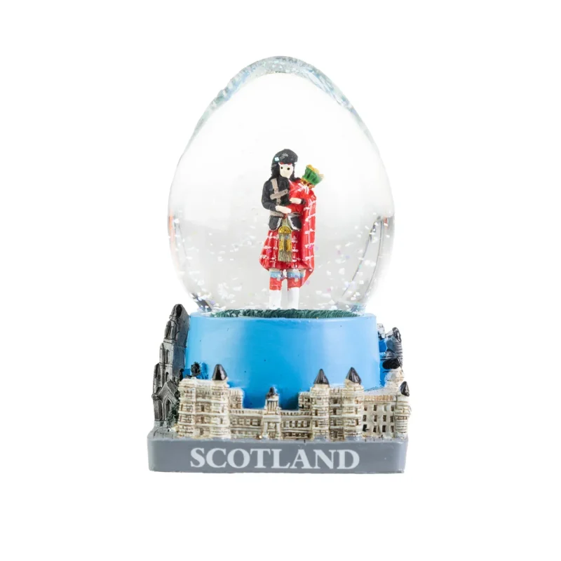 scottish piper snowglobe egg shaped ornament